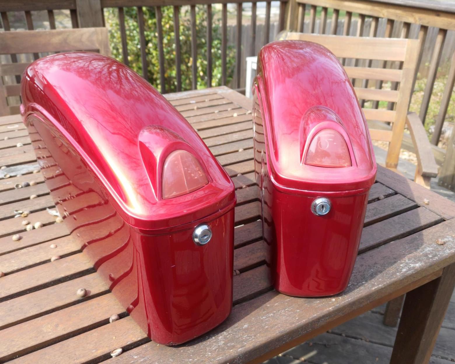 The panniers started out red with lock cores, lights, and shiny paint.