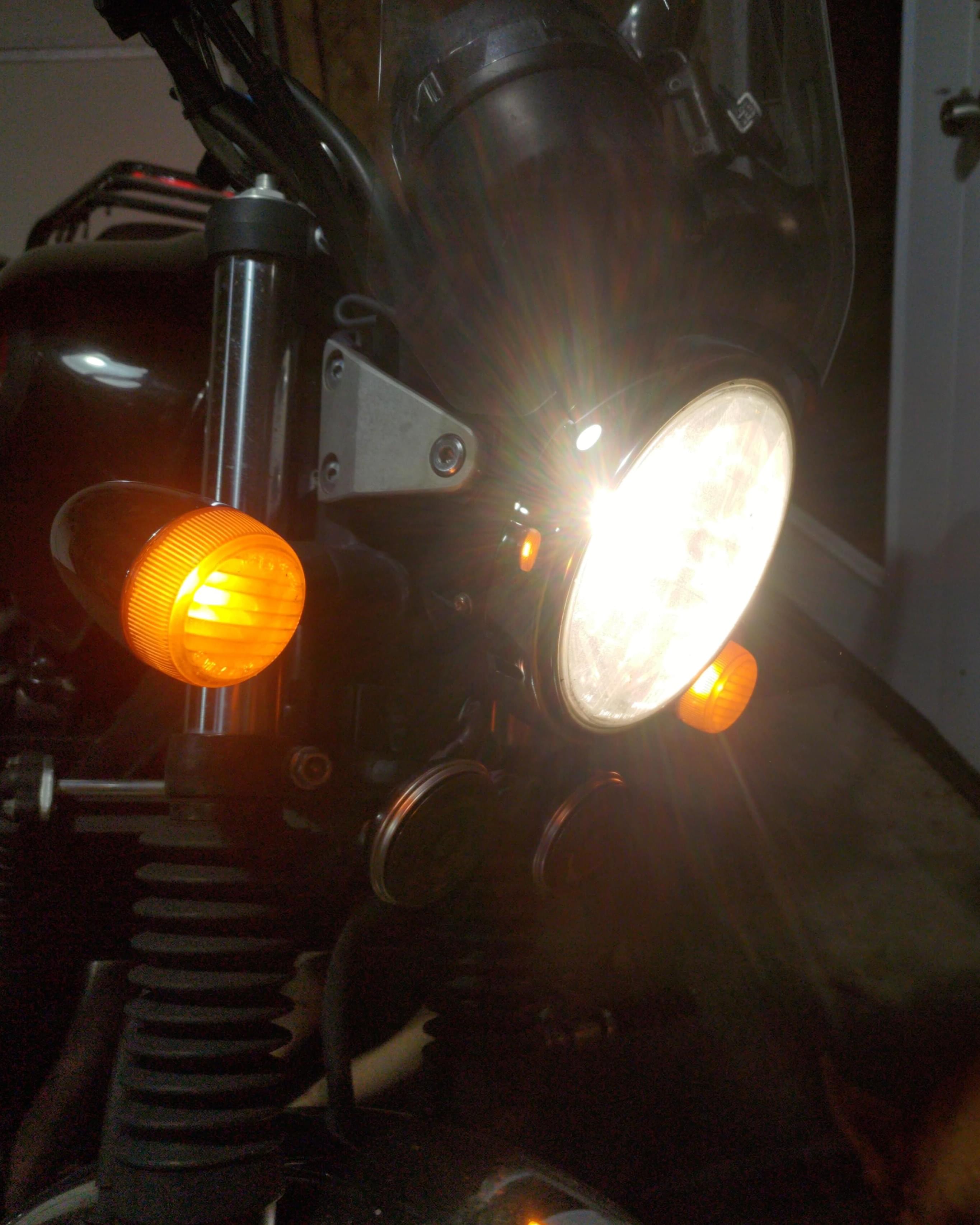 motorcycle headlight with a yellow tint
